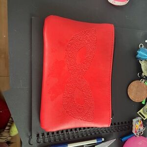 Red Embossed Mask Zip Pouch